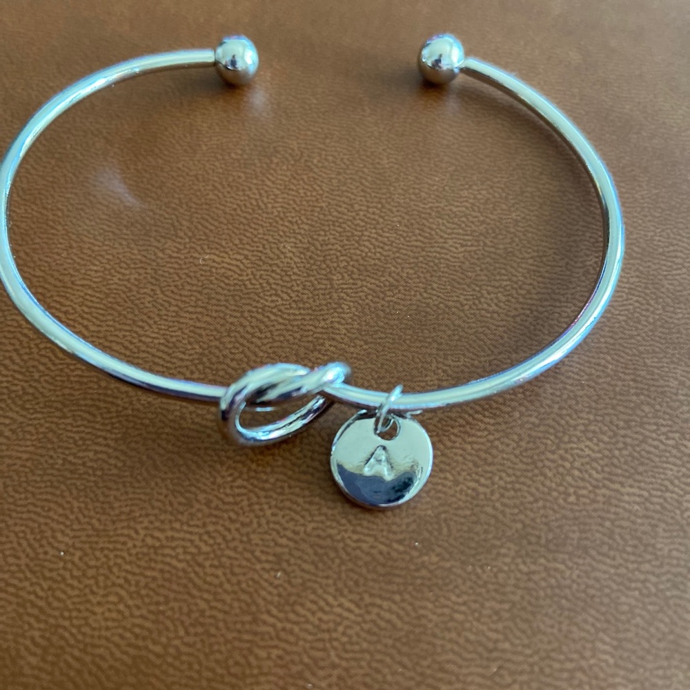 Knotted “A” bracelet